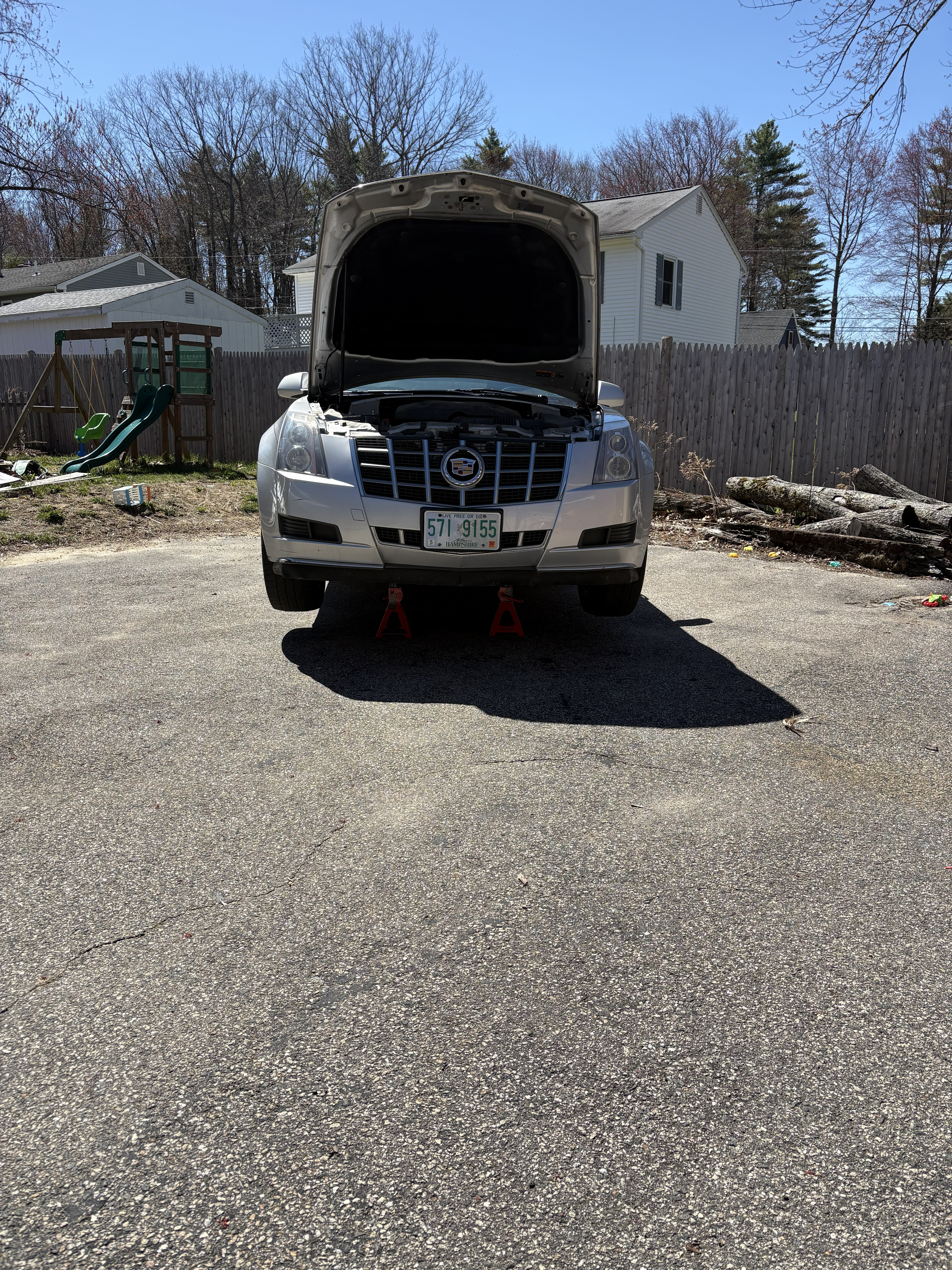 Removing the front bumper to replace the headlight bulbs