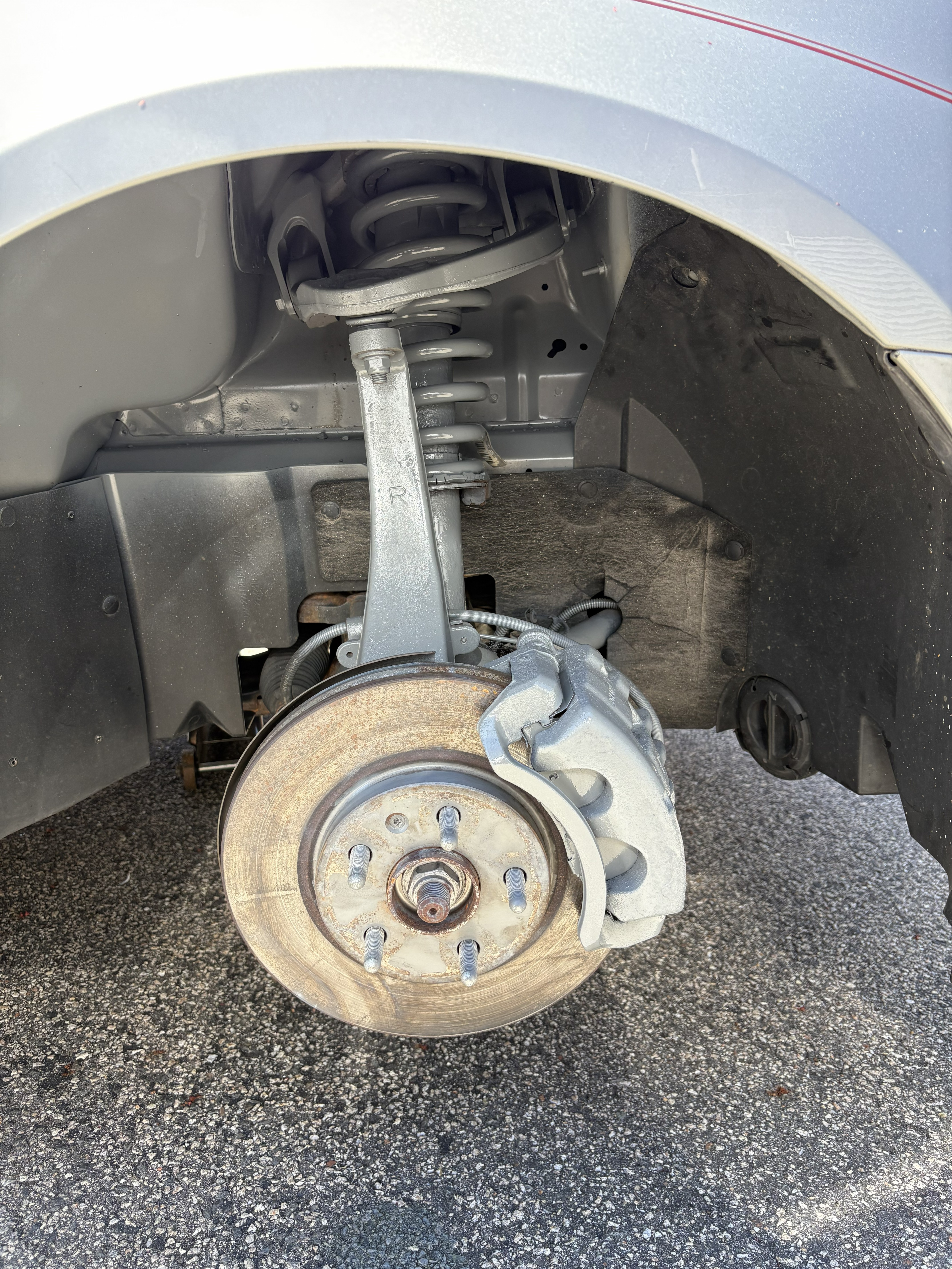 After painting upper control arm and front brake caliper