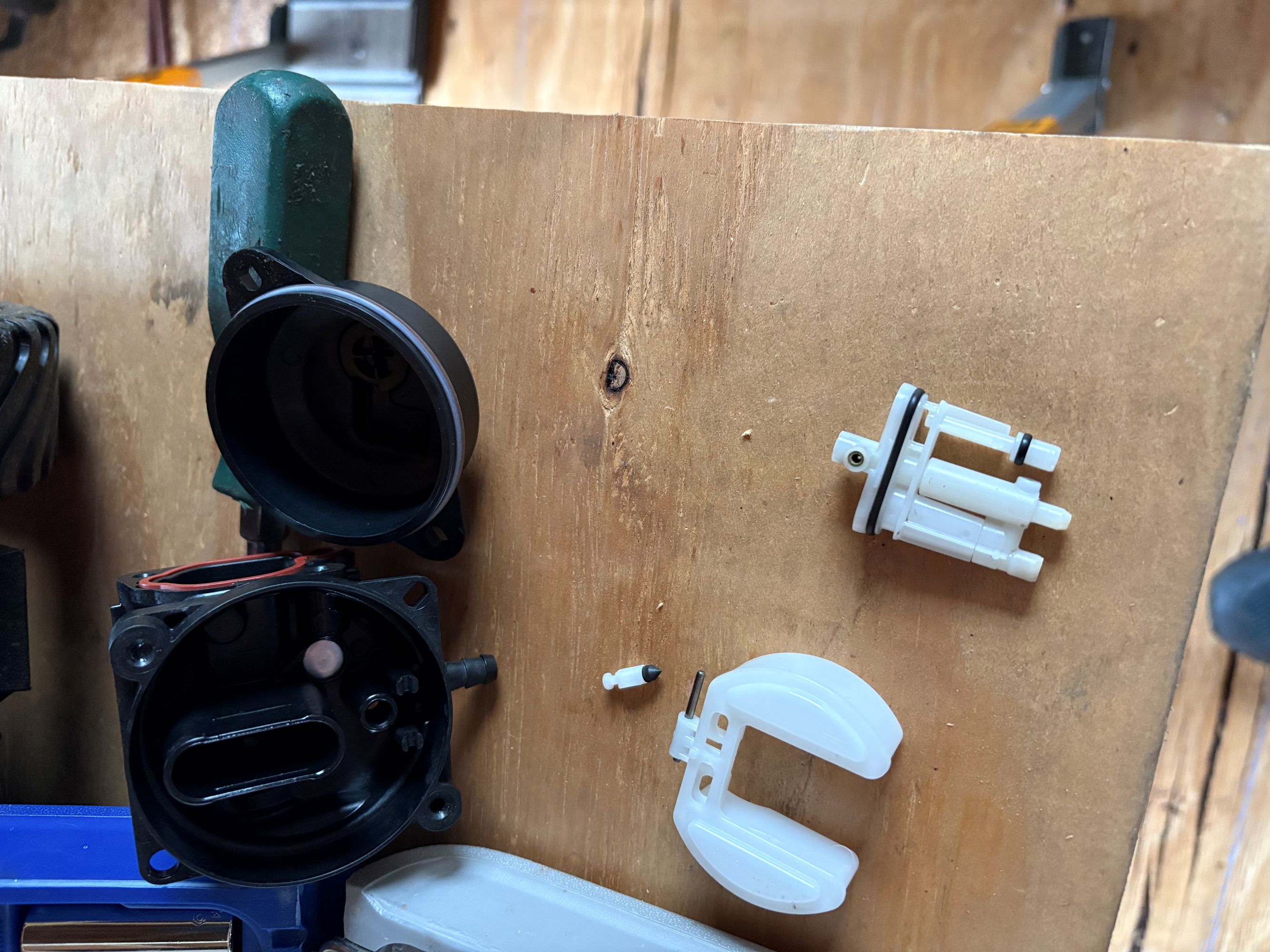Carburetor disassembled on the bench