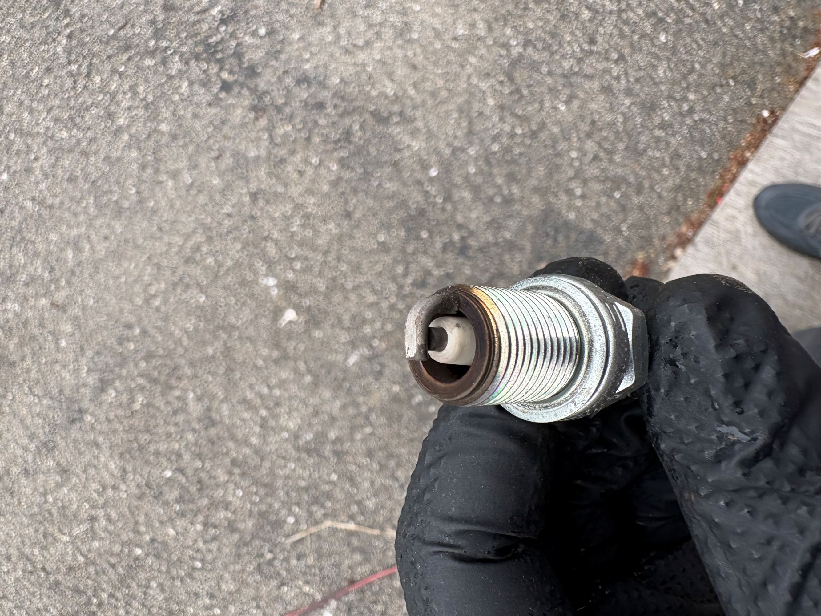 Inspecting the spark plug